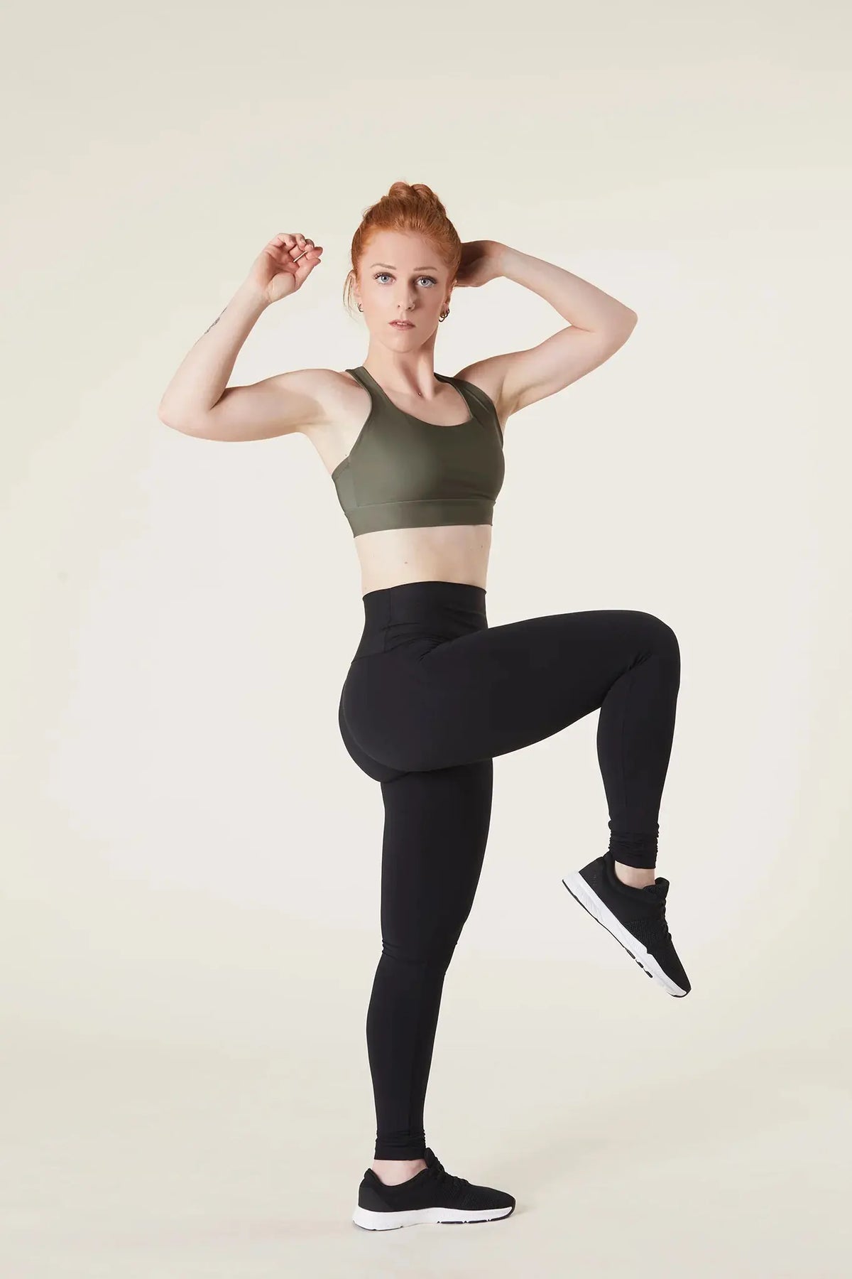 LEGGINGS NERI RUPE CON TOP VERDE